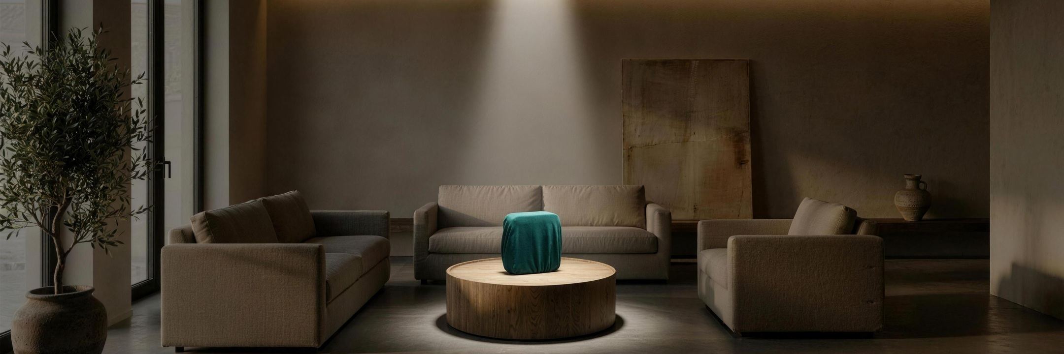 BAVAMA device, covered, on a coffee table in a moody living room